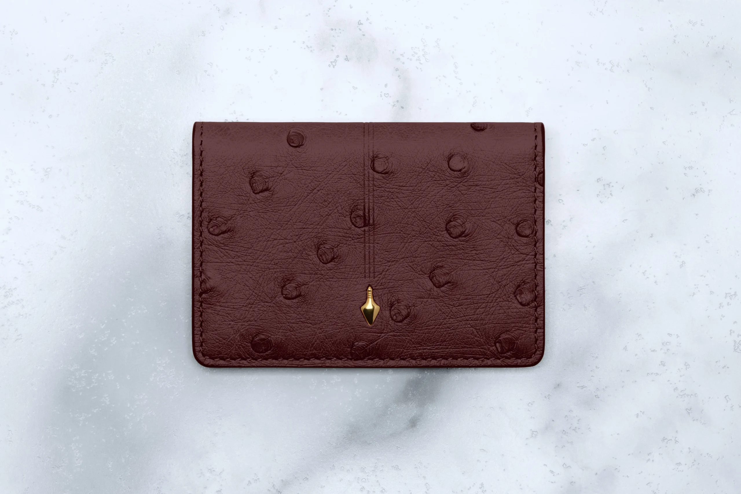 799-cassandre-bifold-wallet-ostrich-1.webp CASSANDRE BIFOLD WALLET - OSTRICH