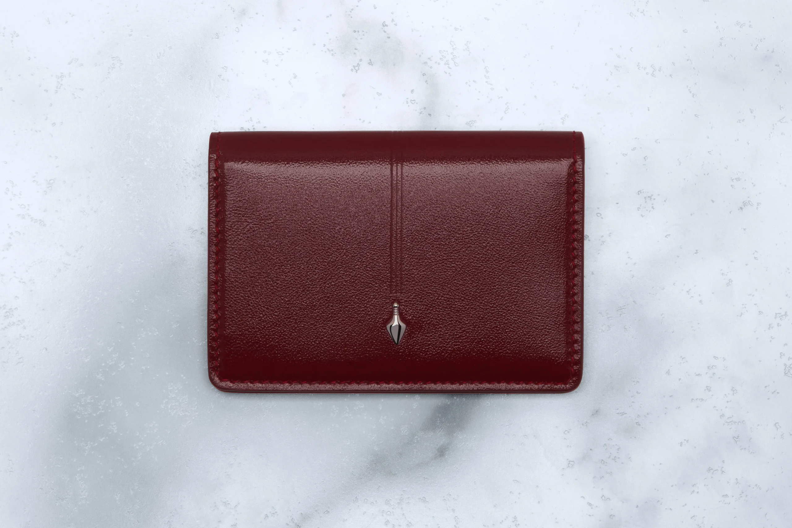804-bordeaux-empire-gloss-bordeaux-empire-lambskin-interior-bordeaux-empire-gloss-bordeaux-empire-lambskin-interior-variation-1.webp CASSANDRE BIFOLD WALLET