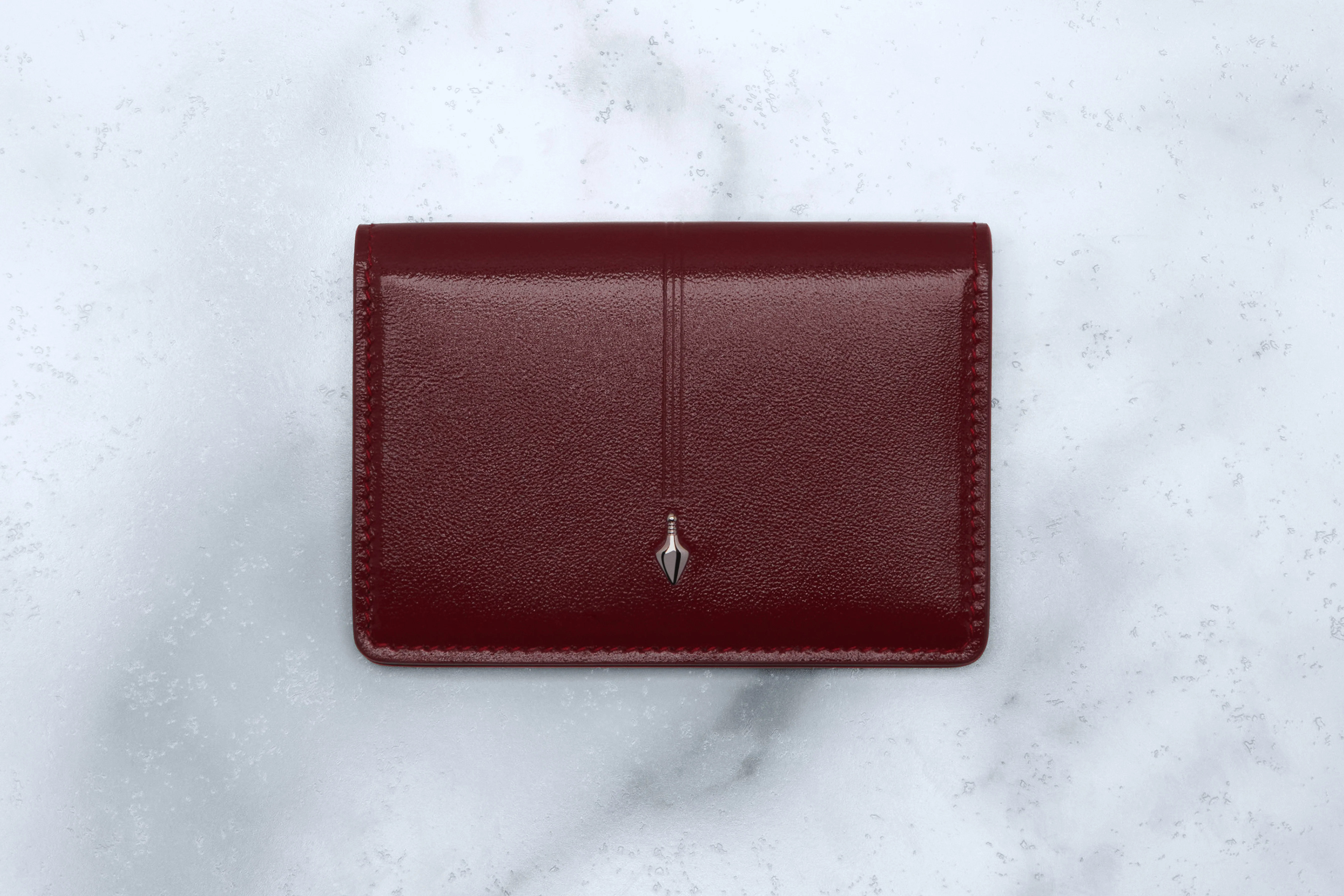 804-bordeaux-empire-gloss-bordeaux-empire-lambskin-interior-bordeaux-empire-gloss-bordeaux-empire-lambskin-interior-variation-1.webp CASSANDRE BIFOLD WALLET
