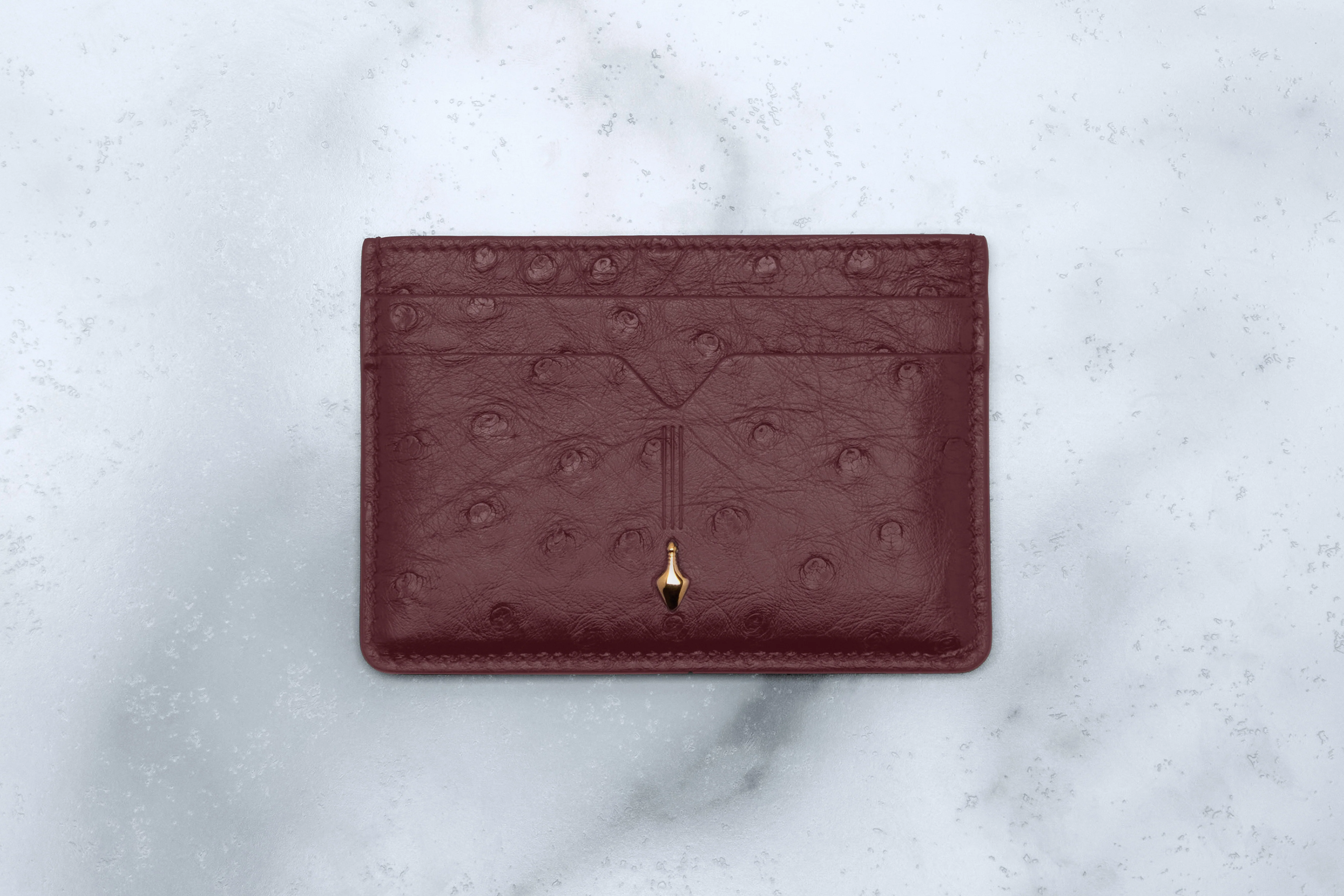 810-bordeaux-empire-ostrich-bordeaux-lambskin-interior-bordeaux-empire-ostrich-bordeaux-lambskin-interior-variation-1.webp THEODORE CARD HOLDER - OSTRICH